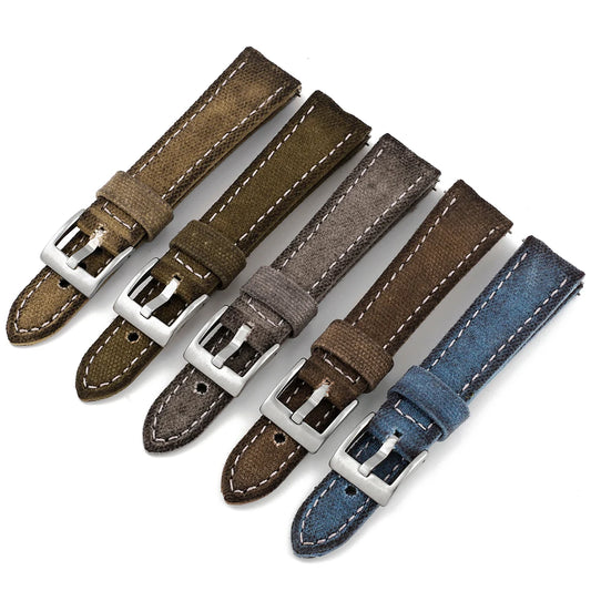 Set of brown and blue watch straps with silver buckles on a white background