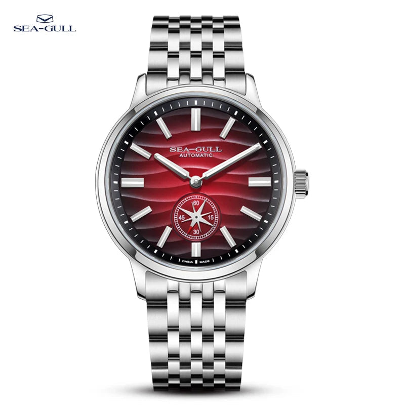 Silver watch with red face on a white background, featuring the Sea-Gull brand.