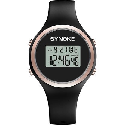 Digital watch with black strap and rose gold accents on a white background