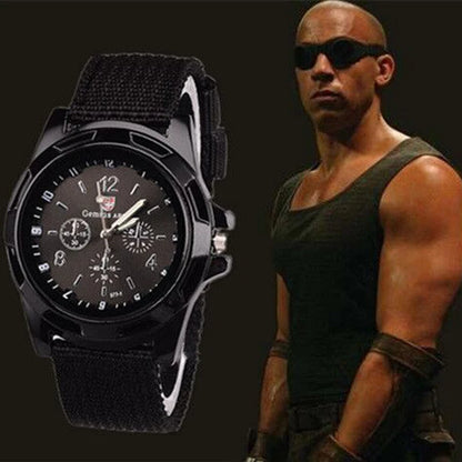 Black wristwatch with detailed face and strap, featuring a character in the background.