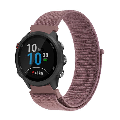Smartwatch with a pink band on a white background