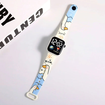 Digital watch with a cartoon duck design on a light gray background