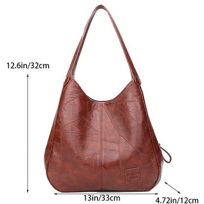 Brown leather handbag with measurements indicated on a white background