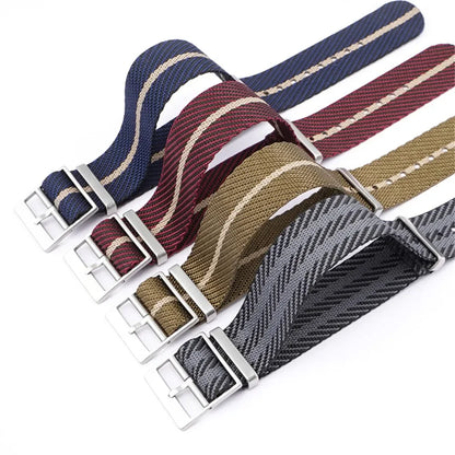 Set of five woven watch straps in different colors with metal buckles on a white background.