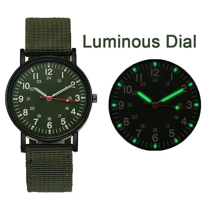 Green wristwatch with a luminous dial on a white background
