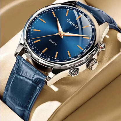 Blue wristwatch with a blue strap on a beige surface