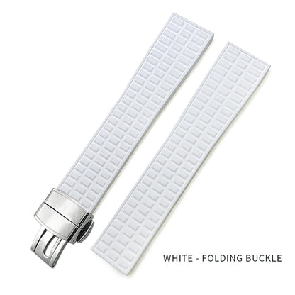 White watch strap with folding buckle on a white background