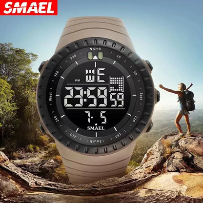 SMAEL digital watch with a scenic background of a person on a mountain top.