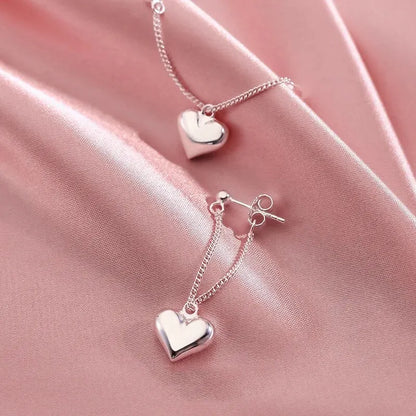 Hollow Heart Hoop Earrings – Geometric Silver Fashion Jewelry for Women & Girls
