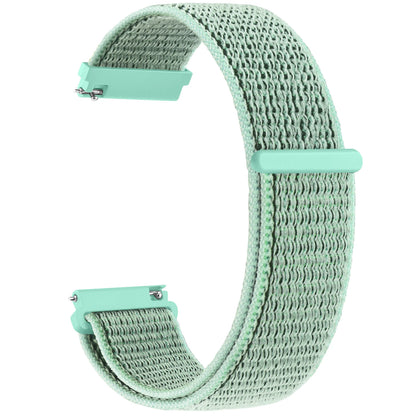 Mint green woven watch strap on a white background