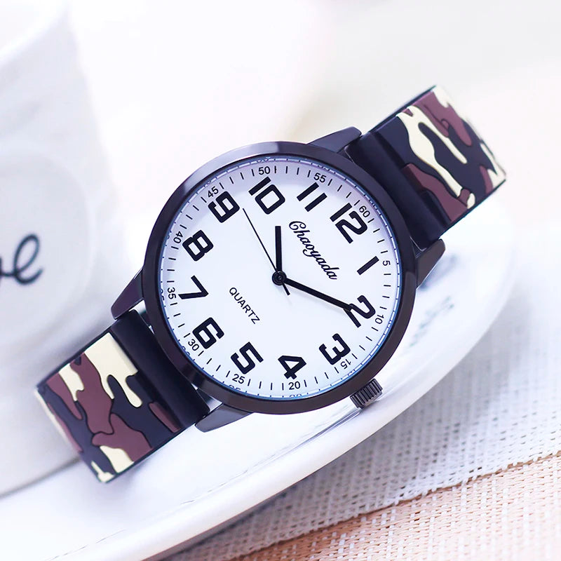 Watch with camouflage band on a white background