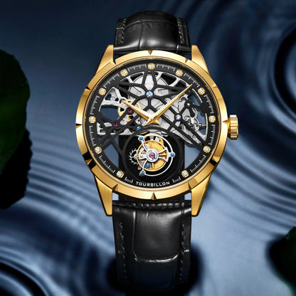 Luxury watch with gold case and black leather strap on a blue textured background