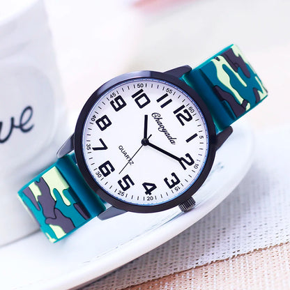 Wristwatch with a camouflage strap on a white background