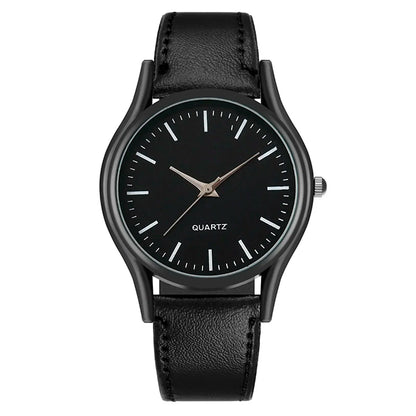 Black wristwatch with a leather strap on a white background