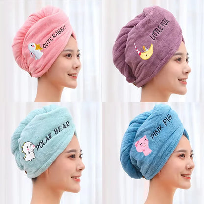 Four colorful towel turbans with animal designs and text on a white background