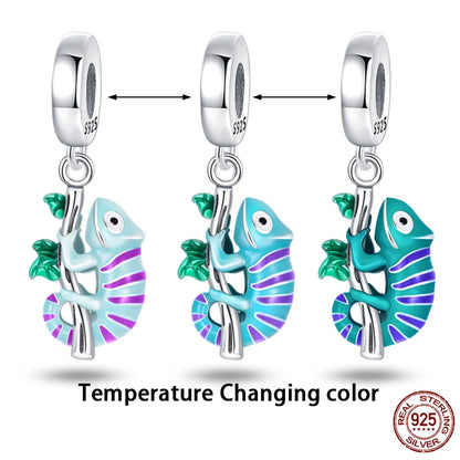 Three temperature-changing fish-shaped charms on a white background with '925 Sterling Silver' stamp.