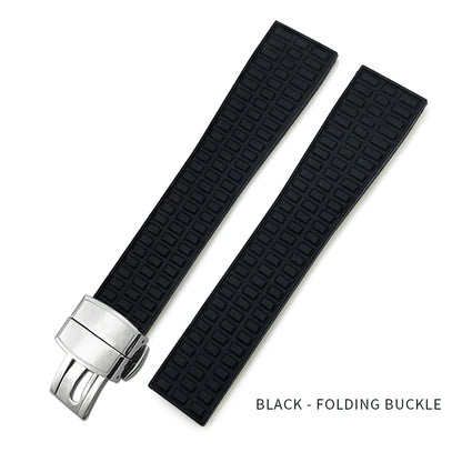 Black textured watch strap with silver folding buckle on a white background