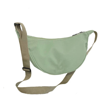 Women's bag - A round-shaped nylon bag with a cross-body strap, suitable for traveling, going to school or shopping. - BeeTrendyShop.COM