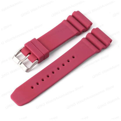 Red watch strap with silver buckle on a white background