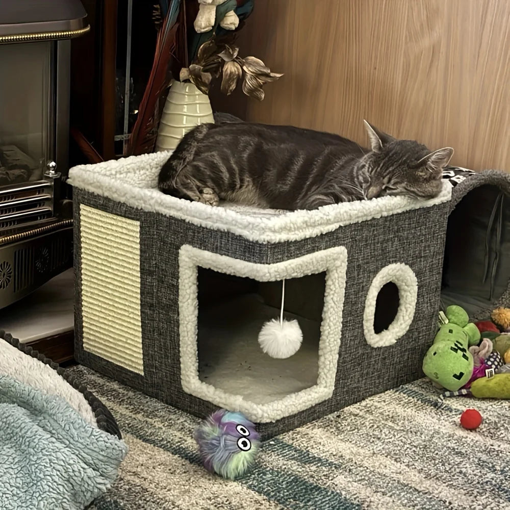 Cat sleeping on a cat tree with toys around in a cozy room.