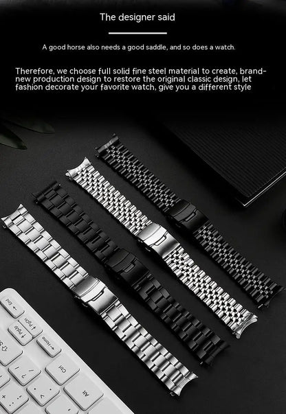 Metal watch straps on a dark surface with text about design and material choice.