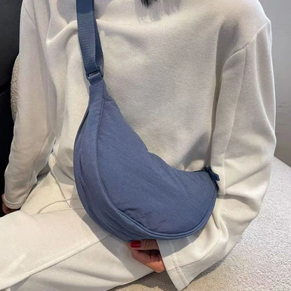 Women's bag - A round-shaped nylon bag with a cross-body strap, suitable for traveling, going to school or shopping. - BeeTrendyShop.COM