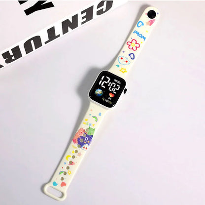 Digital watch with a colorful floral strap on a white background