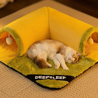 Cat lying on a yellow pet bed with 'DEEPSLEEP' branding