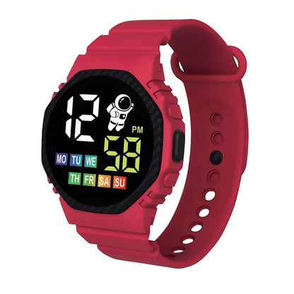 Red digital watch with a colorful display on a white background