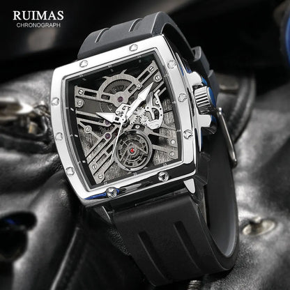 Luxury watch with intricate design on a textured surface, featuring the brand 'RUIMAS'.