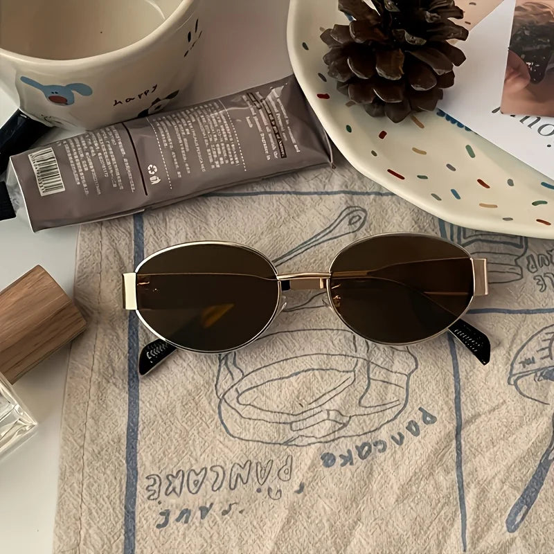 Metallic high-end full-sided oval-shaped sunglasses, a retro, simple and fashionable daily wear item