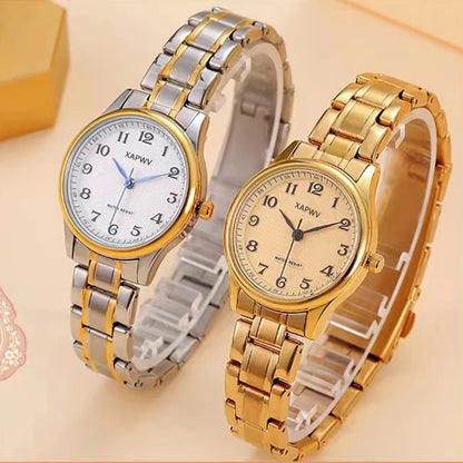 Two watches, one silver and one gold, on a beige background.