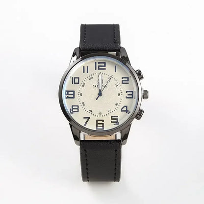 Black wristwatch with a white face on a white background