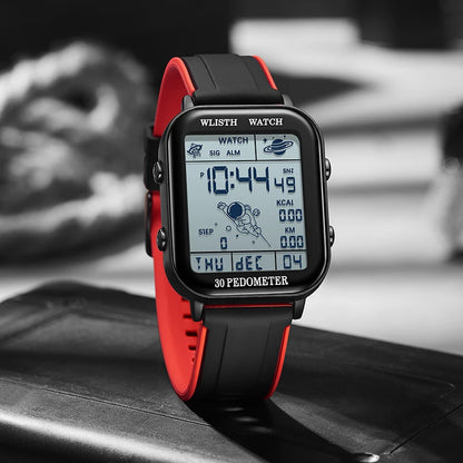 Digital watch with red and black strap on a reflective surface