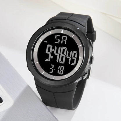 Black digital watch on a white background
