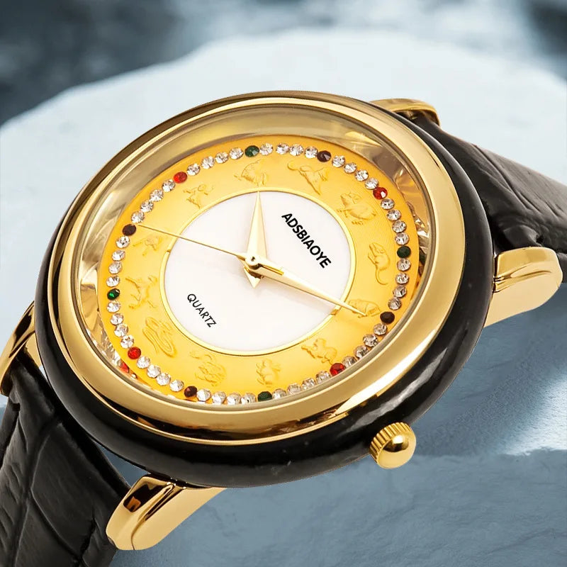 Gold watch with black strap on a light blue background