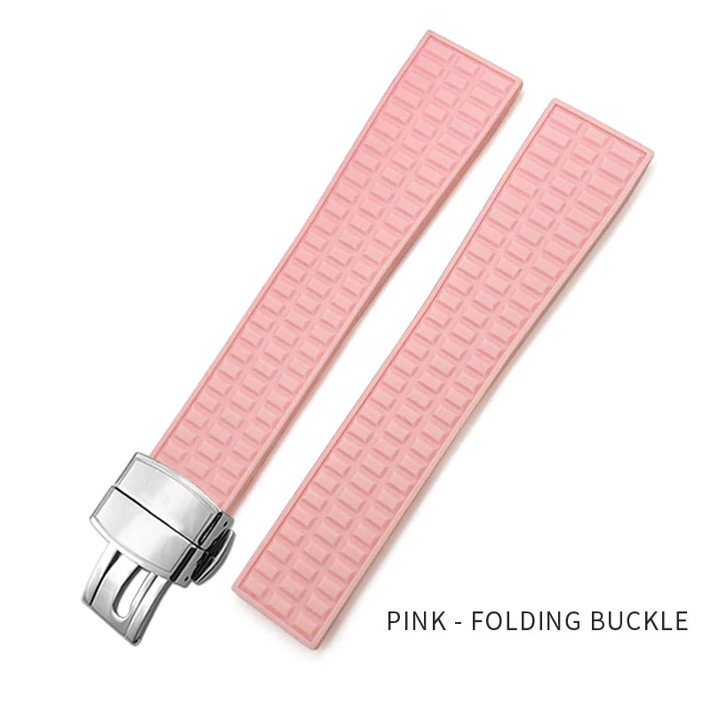 Pink watch strap with folding buckle on a white background