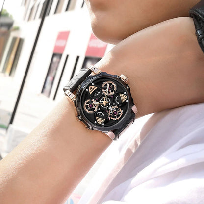 Close-up of a person wearing a black and rose gold watch with a blurred background
