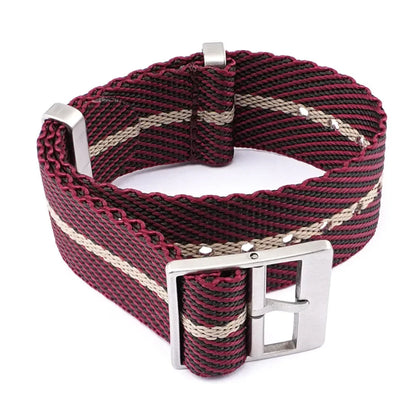 Woven watch strap with a metal buckle on a white background