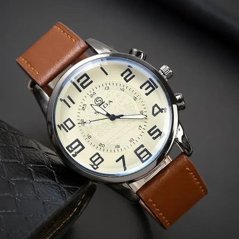 Watch with brown leather strap on a dark background