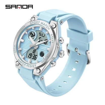 Light blue digital watch with silver accents on a white background, featuring the brand 'SANDA'.