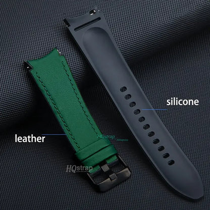 Green leather and black silicone watch strap on a textured gray background