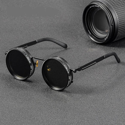 Steampunk-style goggles with a camera lens on a gray background, featuring the brand 'Crixalis'.