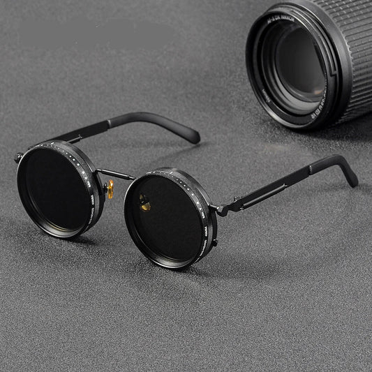 Steampunk-style goggles with a camera lens on a gray background, featuring the brand 'Crixalis'.