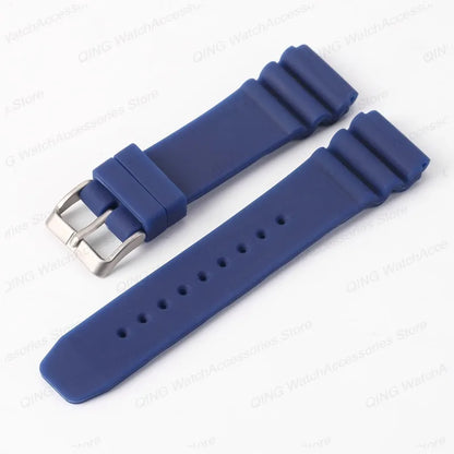 Blue watch strap with silver buckle on a white background