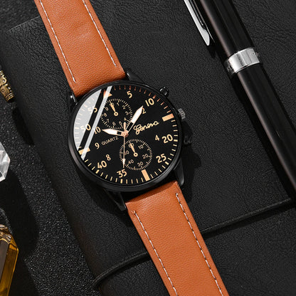 Watch with brown leather strap and black dial on a dark textured surface