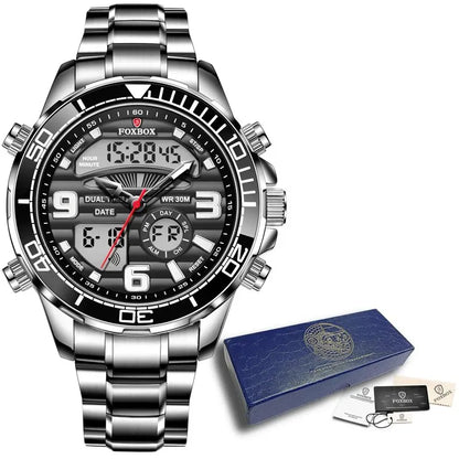 Silver wristwatch with digital display and Foxbox branding, accompanied by a blue box and accessories on a white background.