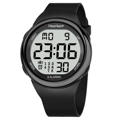 Black digital watch with a white background