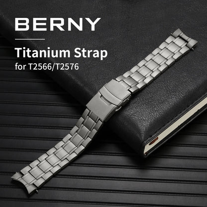 Silver watch strap with BERNY branding on a dark textured background