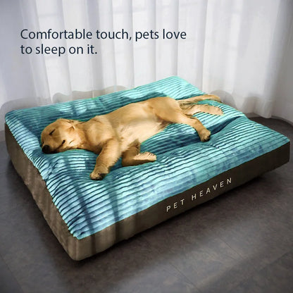 Dog sleeping on a Pet Heaven branded pet bed with teal cover and brown base.